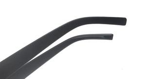Detailed macro view of the curved temple tips on black square oversized fashion sunglasses