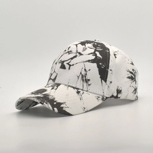 Tie-dye cotton baseball cap in black and white pattern with a curved brim for sun protection