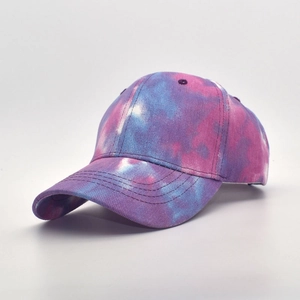 Detail view of tie-dye baseball cap with blue purple pink nebula pattern and stitching