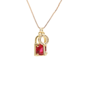 Gold plated necklace with red square gemstone lock and zircon key pendant on chain