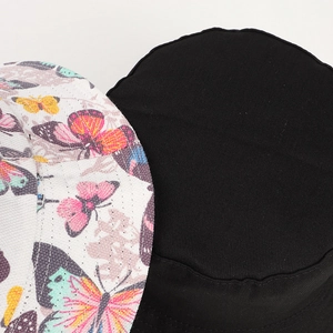 Wendbarer Fischerhut aus Canvas mit Schmetterlingsdruck und schwarzem Design für Damen