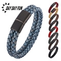Detail showing double-layer braided leather bracelets with secure black magnetic clasp
