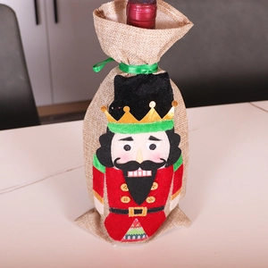 Christmas nutcracker wine bottle cover made of burlap for festive table decoration