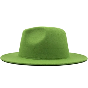 Classic green wool fedora hat with flat brim and pinched crown on white background
