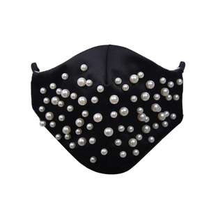 Fashionable black face mask with decorative white pearls and adjustable ear loops