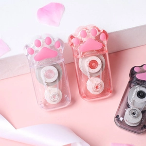Detailed view of cat paw correction tapes in pink, clear white and smoke grey colors