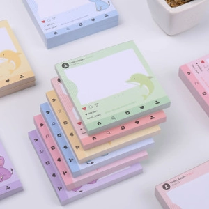 Detail view of colorful animal sticky notes featuring cute dolphin and elephant designs