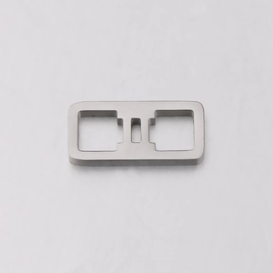 Macro shot of silver stainless steel square cutout zodiac pendant for DIY jewelry making