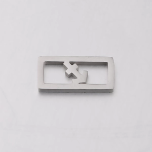 Macro shot of silver stainless steel square pendant with cutout anchor design detail