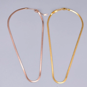 Minimalist herringbone chain necklace in gold and rose gold with lobster clasp closure