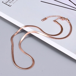 Minimalist rose gold snake chain necklace with flat polished links and K18 lobster clasp