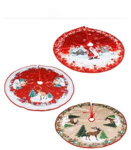 Detail of Christmas tree skirts featuring Santa, reindeer, and snowflakes patterns