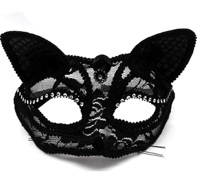 Detail of lace cat mask with black sequins, rhinestones and delicate whiskers