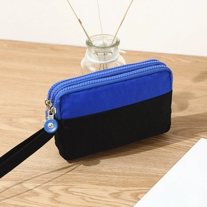 Three-layer nylon wristlet phone pouch with zipper compartments in blue and black