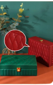 Detail of waterproof PU leather jewelry box with classic quilted pattern and gold buckle