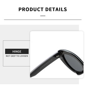 Détail de la charnière robuste sur les lunettes de soleil ovales noires modèle YT7748