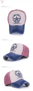 Close-up of distressed denim brim and vintage shield embroidery on baseball cap