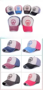 Close-up of vintage washed baseball caps with star embroidery and distressed brim detail