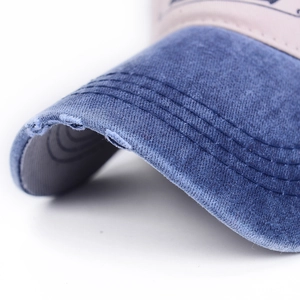 Blue washed denim baseball cap with vintage distressed brim and five-star embroidery details