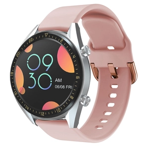 Detailed view of pink silicone smartwatch strap with a sleek silver round metal case