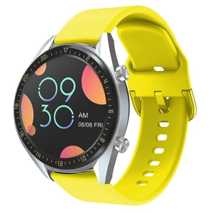 Detail view of a smart watch with a vibrant yellow silicone strap and silver metal case