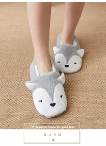 Detailed view of gray fox plush house socks with thick lamb wool lining and non-slip soles
