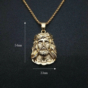 Detail of 18k gold-plated Jesus pendant with iced diamonds and 54x33mm dimensions