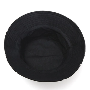 Top-down view of black cotton bucket hat showing interior stitching and round crown detail