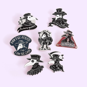 Set of 7 plague doctor enamel pins with crow masks and gothic motivational text