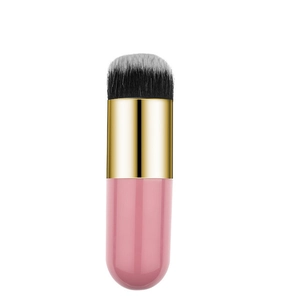 Close-up of soft black and white bristles on pink chunky foundation brush with gold ferrule