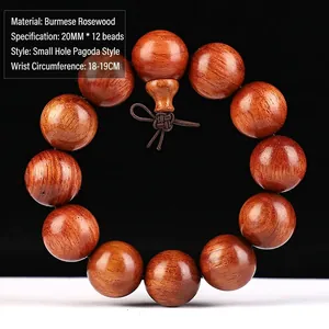 Makroaufnahme von 20mm Birma-Palisander-Perlen mit natürlicher Maserung und Textur