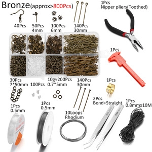 Detail view of 800pcs bronze jewelry making kit with lobster clasps and pliers
