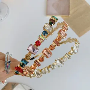 Detailed view of handmade baroque headbands with multicolor crystals on slim metal bands