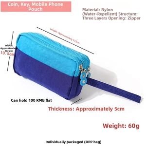 Three-layer nylon wristlet phone pouch with water-resistant zippers and purple color blocks