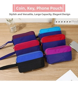 Detailed top view of multi-layered nylon wristlet pouches in various vibrant color combinations