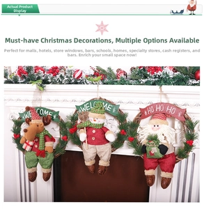 Detail of Nordic Christmas wreaths with Santa and reindeer on a white fireplace