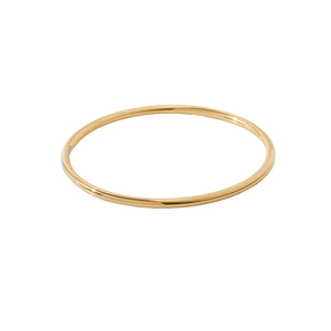 Minimalist polished gold stainless steel bangles for women in a stackable sleek design