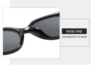 Detail showing the integrated nose pad design for lightweight comfort on black cat-eye sunglasses
