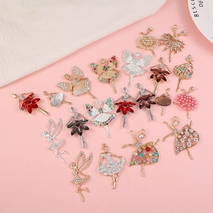 Detailed close-up of rhinestone ballet dancer charms for DIY phone case accessories