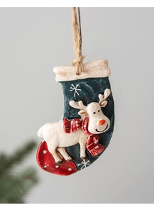 Detail of hand-painted resin Christmas stocking ornament with reindeer and rustic rope hanger