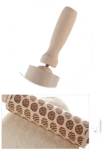 Close-up of wooden rolling pin with embossed Easter egg patterns on white dough