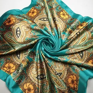 Detailed close-up of 90cm satin square scarf with paisley and floral prints