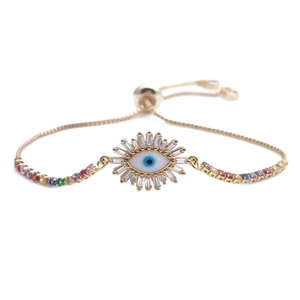 Adjustable gold evil eye chain bracelet with multicolored zircons on white background