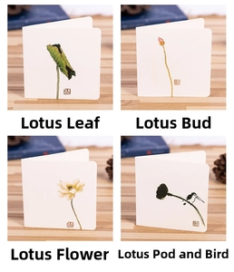 Detail of four square folding cards featuring ink wash lotus illustrations and wood background