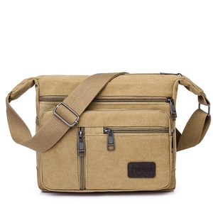 Men's khaki multi-pocket canvas crossbody bag with adjustable strap and thick durable material