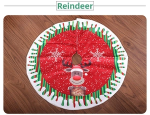 Close-up of 80cm Christmas tree skirt with reindeer, snowflakes and Warm Wishes text