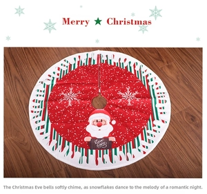 Detail of 80cm red Christmas tree skirt featuring Santa Claus and white snowflakes decor
