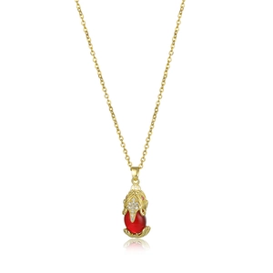Golden PiXiu pendant necklace with red crystal on delicate chain with reflection