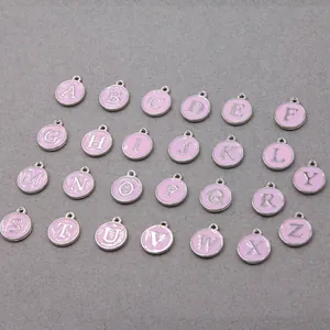 26-piece set of A-Z capital letter pendants with pink enamel and alloy metal finish