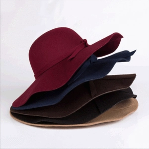 Stack of wide brim wool fedora hats in burgundy, navy, coffee, black and khaki colors